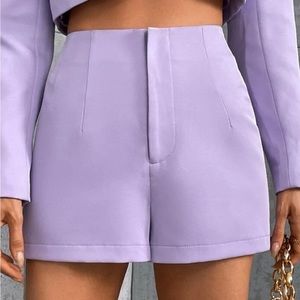 Lilac shorts.